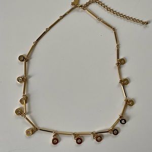 Medium length brand new gold Kate Spade necklace
